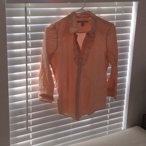 Women’s ruffled button down